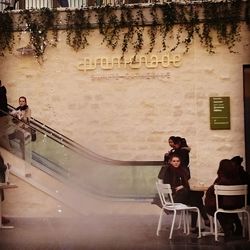 Woman sitting on bench