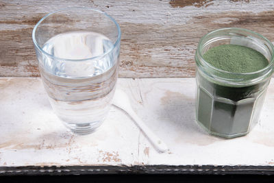 High angle view of drink in glass on table