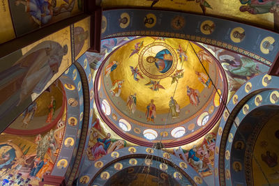 Low angle view of ornate ceiling in building