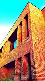 Low angle view of brick wall