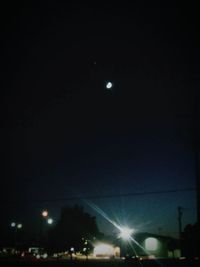 Low angle view of illuminated street light