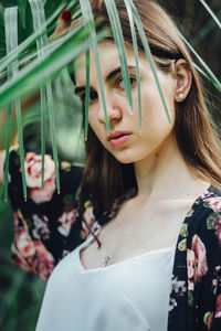 Portrait of young woman looking away
