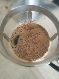 High angle view of coffee cup on table