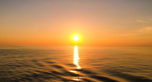 Scenic view of sea during sunset