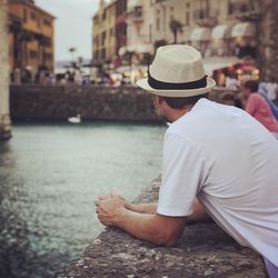 Side view of young man looking at view