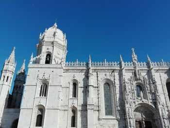 Low angle view of cathedral against blue sky