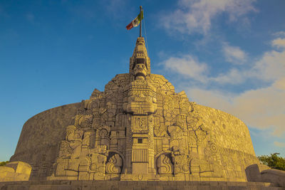 Low angle view of temple against sky during sunset