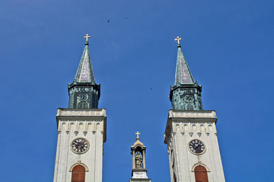  catholic church low angle view of clock tower against sky