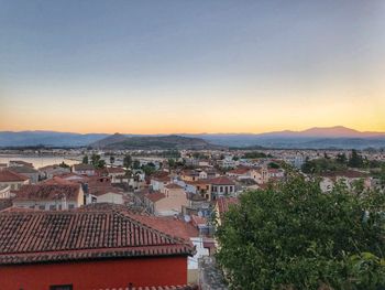 High angle view of townscape against sky at sunset