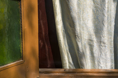 Close-up of curtain against window