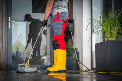 Low section of man working at home