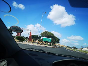 Road seen through car windshield