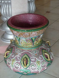 High angle view of floral pattern on tiled floor