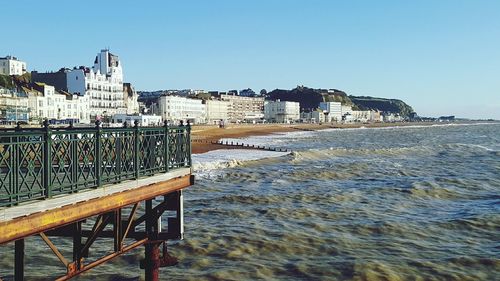 Scenic view of sea against clear blue sky