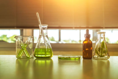 Close-up of laboratory glassware on table 