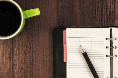 Directly above shot of coffee cup on table