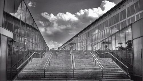 Low angle view of building against cloudy sky