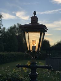 Close-up of street light against sky