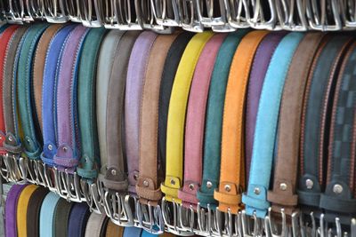 Full frame shot of colorful belts for sale at store