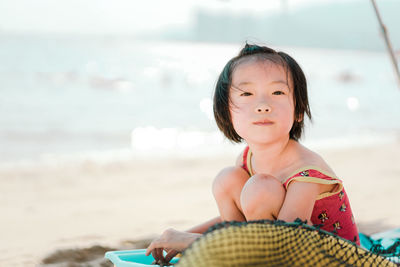 Girl playing in sand