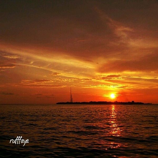 sunset, water, sea, waterfront, orange color, sky, scenics, tranquility, beauty in nature, tranquil scene, sun, rippled, nautical vessel, transportation, nature, idyllic, horizon over water, cloud - sky, boat, reflection