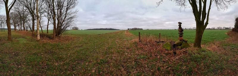 Scenic view of land against sky