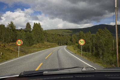 Speed limit signs on road