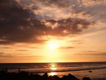 Scenic view of sea at sunset