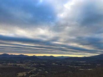 Scenic view of mountains against sky during sunset