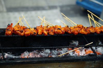 Close-up of fire on barbecue grill