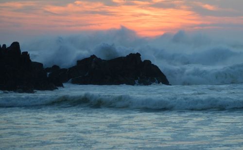 Scenic view of sea against sky during sunset