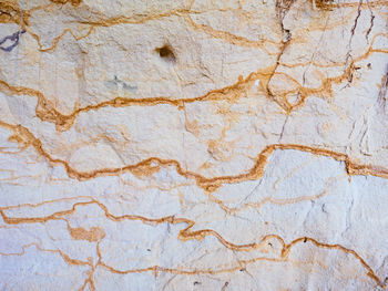 Smooth surface of layered sandstone sediment rock. colorful sandstone mine