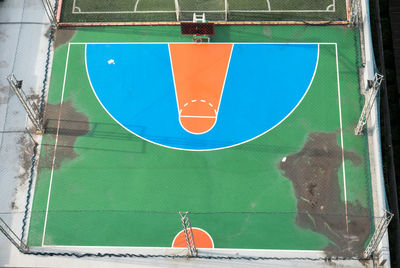 Low angle view of basketball hoop against blue sky