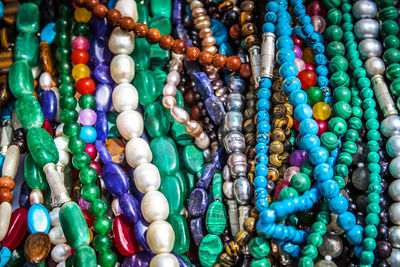 Close-up of multi colored jewelry for sale