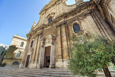 Low angle view of historical building against sky