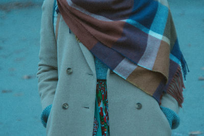 Close-up of man standing in snow