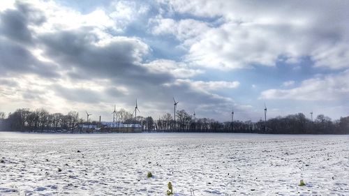 Scenic view of frozen lake against sky