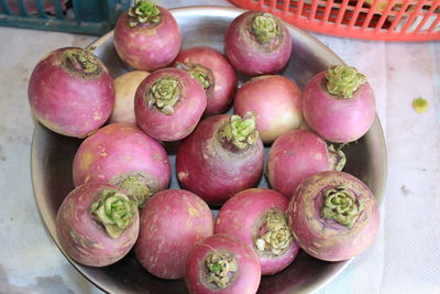 High angle view of fruits in basket on table