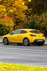 Yellow car on street