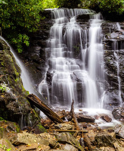 Scenic view of waterfall in forest