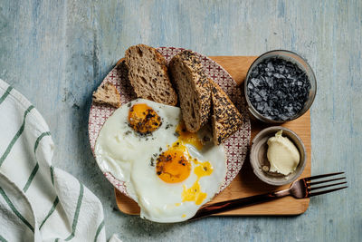 Fried egg. view of two fried eggs on a frying pan. ready to eat with breakfast or lunch