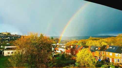 Rainbow over city