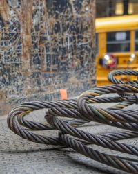 Close-up of rope tied on metal