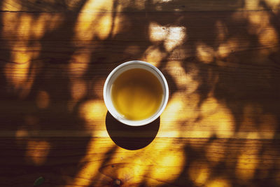 High angle view of coffee cup on table