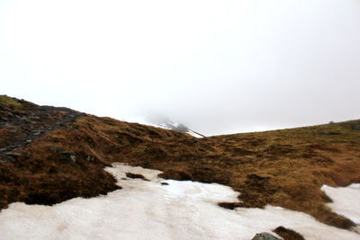 Scenic view of mountain against clear sky