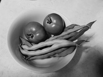 High angle view of fruits in bowl on table