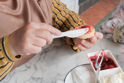 Close-up of hand holding food