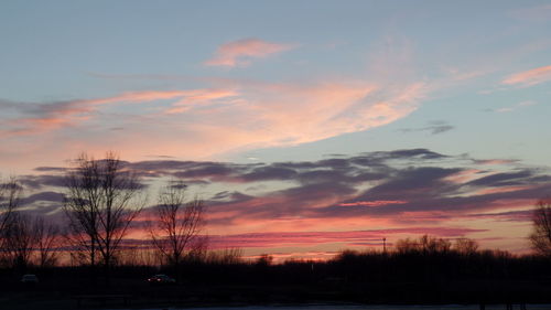 Scenic view of dramatic sky during sunset