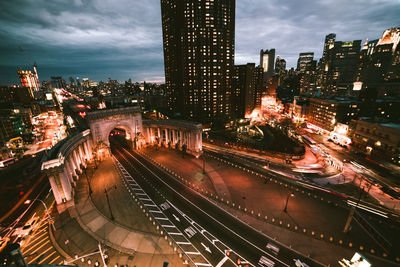 Aerial view of illuminated city at night