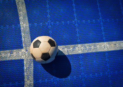 High angle view of soccer ball on table